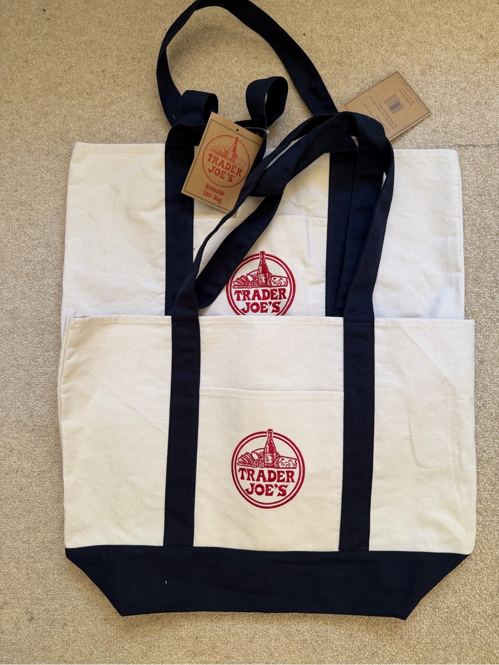 2 Trader Joe’s large Canvas Tote Bag in Cream and  Blue with Red Logo